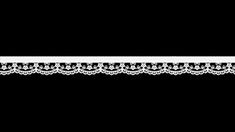 a white lace border on a black background