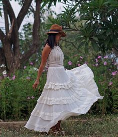 "Boho Maxi Full Circle Wedding Skirt Tiered full circle long skirt made from unbleached and undyed raw cotton in off-white color. Sizing: Made in one size to fit S to L / US: 4/6/8/10/12 Measurement; Elastic waist 24-40\" Hip max 50\" Length 41\" Bottom hem circumference 100\" **Model is a size US 6. 33\" bust, 36\" hip. 165 cm tall** Description: Stunningly beautiful maxi full circle skirt made from raw cotton material. Lined with the same fabric to knee level (not see-through). Full elastic wa Gathered Maxi Skirt For Beach, Ruffled Maxi Skirt For Beach, Ruffled Maxi Length Beach Skirt, Ruffled Maxi Length Skirt For The Beach, Ruffled Maxi Skirt For The Beach, Maxi Length Gathered Skirt For Beach, Beach Maxi Length Gathered Skirt, Bohemian Tiered Dress With Relaxed Skirt, Bohemian Dress With Relaxed Tiered Skirt