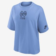 This Legacy Established Boxy T-Shirt helps you support the North Carolina Tar Heels with retro team details. Its soft cotton fabric delivers a comfortable feel on game day. Retro Nike T-shirt With Letter Print, Nike Retro T-shirt With Letter Print, Nike College Tops With Logo Print, Nike Tops With Logo Print For College, Nike College Tops With Team Logo, Nike Collegiate Tops With Letter Print, Nike Collegiate Tops For College, Vintage Nike Cotton Tops, Nike Graphic Print Tops For College