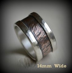 two rings made out of silver and copper are shown with the words, 4mm wide