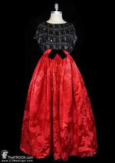 "BIG NEWS After 22 years, our website, TheFROCK.com, has had a makeover. Check out the new site, and join our mailing list for new arrivals.  Grand vintage Balenciaga ballgown with a decadently beaded black semi-sleeve bodice over a generous red silk damask skirt. Rear zipper, black velvet bow waist. The beaded overbodice has a bit of a relaxed blousy fit, the bodice interior measures bust 36.5\", the waist is 28\", and the length is 57\". Condition is excellent.  Layaway is available. ALL DELIV Taffeta Gown For Evening Gala, Evening Gown With Short Sleeves For Prom Season, Glamorous Short Sleeve Gown For Evening, Glamorous Short Sleeve Evening Gown, Short Sleeve Evening Gown For Prom Season, Velvet Evening Gown For Prom Season, Evening Gown With Full Skirt, Glamorous Velvet Evening Gown, Red Silk Evening Dress For Red Carpet