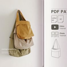 a bag hanging from the side of a wall next to an open book with instructions on how to sew