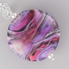 A handmade pink and purple glass bead in an organic pattern on a long sterling silver chain Pink Seashell, All Shades Of Pink, Pink Accessories, Pink And Silver, Purple Glass, Pink Glass, Pink Baby, Pink And Purple, Shades Of Pink