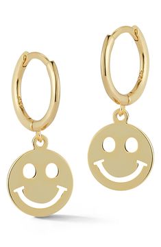 Be happy in these gold vermeil huggie earrings with cheerful smiley face drops for whimsical style. Yellow gold vermeil over sterling silver smiley face drop huggie earrings. Hinged post back. ImportedOrders cannot be shipped to Canada, Puerto Rico, APO, FPO or P.O. Boxes. Playful Gold Hypoallergenic Earrings, Playful Hypoallergenic Gold Earrings, Novelty Gold Earrings, Playful Gold Dangle Earrings, Playful Gold Jewelry With Smiley Face, Playful Gold Smiley Face Jewelry, Playful Gold Drop Earrings Jewelry, Playful Gold Single Earring, Playful Smiley Face Jewelry For Everyday