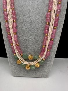 Pink Traditional Necklace With Stone Work, Traditional Pink Necklace With Stone Work, Traditional Pink Stone Work Necklaces, Pink Gemstone Beads Necklace For Wedding, Traditional Pink Jewelry With Stones, Pink Jewelry With Stones For Celebration, Pink Temple Jewelry Necklace With Stone Work, Pink Faceted Beads Gems And Cabochons For Gifts, Pink Stone Work Temple Jewelry Necklace