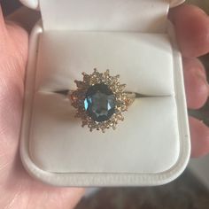 Gorgeous 14k Gold And Blue Sapphire Center Stone. Diamonds On The Outside. Never Worn, In Original White Leather Ring Box With Ravello Signage And White Box. Would Make Excellent Gift As New And All Intact Casings. Got This From My Mom. Looks Very Exquisite And Expensive, Quality. Added Pics Form Website To See The Brand/Qualities. Please Look Up Ravello Beverly Hills For Info On The Brand. Gold Gemstone Cluster Ring For Proposal, Luxury 14k Gold Cluster Ring With Accent Stones, Luxury Cluster Ring With Accent Stones In 14k Gold, Yellow Gold Gemstone Jewelry For Proposal, Sapphire Cluster Ring For Formal Occasions, Formal Sapphire Diamond Ring In 14k Gold, Proposal Jewelry In Yellow Gold With Gemstones, Formal Sapphire Cluster Ring With High Clarity, Heirloom Jewelry With Accent Stones For Proposal