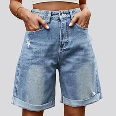 Elevate your summer style game with our sanded women's denim shorts from the 2024 Summer Collection a perfect blend of 90s nostalgia and vogue trendy.Distinctive Features: 90s Inspired: Step back in time with these shorts, a nod to the iconic modern of the 20th-century that will make you feel like a fashion icon. Straight Fit: The straight fit of these shorts provides a flattering and leisurely silhouette, perfect for any body type. Light-Wash Finish: The light-wash finish adds a touch of vintage charm and effortlessly matches any summer outfit. Knee-Length Cut: These shorts hit just above the knee, making them versatile for any occasion and easy to dress up or down. Sanded Texture: The sanded texture gives these shorts a unique and city look, perfect for making a statement. Whiskered Deta 90s Looks, Vintage Trends, 90s Nostalgia, Shorts For Women, 90s Inspired, Denim Shorts Women, Step Back, Fashion Icon, High Waisted Denim