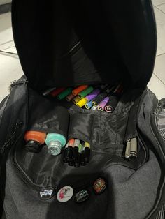 the contents of a backpack are neatly packed