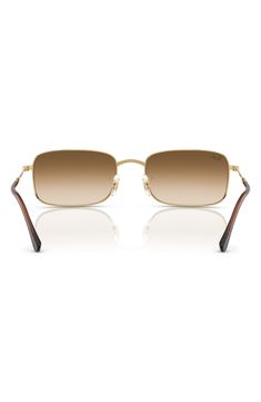 A sleek rectangular silhouette adds retro-cool appeal to stylish sunnies fitted with adjustable nose pads for a secure fit. 59mm lens width; 20mm bridge width; 145mm temple length 100% UV protection Adjustable nonslip nose pads Metal Imported Brown Rectangular Aviator Sunglasses With Gradient Lenses, Classic Brown Rectangular Shield Sunglasses, Classic Gold Shield Sunglasses With Uva Protection, Luxury Rectangular Sunglasses With Uv Protection, Elegant Rectangular Shield Sunglasses With Uva Protection, Luxury Rectangular Sunglasses With Gradient Lenses, Classic Shield Sunglasses With Metal Square Frame, Classic Shield Sunglasses With Metal Frame, Classic Rectangular Sunglasses For Summer