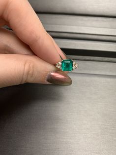 Metal: 14 karat yellow gold Main Stone: Natural Fine Emerald 1.80 carat Square Emerald Faceted Origin, Columbia Side Stones: 6 Natural Diamonds .25 carat GH/VS Size: 5.5, Can be Resized by most jewelers with a LASER Welder only. (contact your local jeweler) Vintage: 90s Great Mother's Day gift idea for the mom who loves jewelry and has it all Exquisite 14k Gold Emerald Ring With Center Stone, Yellow Gold Emerald Ring With Princess Cut, Luxury Diamond Ring With Emerald Accent Stones, Dazzling Diamond Emerald Ring With Accent Stones, Gold Emerald Cut Emerald Ring Gia Certified, Dazzling Emerald Ring With Diamond Accent Stones, 14k Gold Emerald Ring With Princess And Brilliant Cut, Gia Certified Gold Emerald Cut Emerald Ring, Exquisite Emerald Cut Yellow Gold Emerald Ring