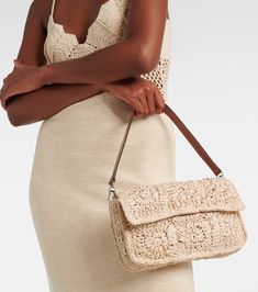 Intrecciato Weave Crochet Shoulder Bag For Travel, Elegant Crochet Bag With Intrecciato Weave In Natural Color, Beige Intrecciato Weave Crochet Beach Bag, Beige Crochet Bag With Intrecciato Weave For Beach, Beige Intrecciato Weave Straw Bag, Summer Beige Crochet Bag With Intrecciato Weave, Chic Beige Straw Bag With Intrecciato Weave, Chic Crochet Bag With Intrecciato Weave In Natural, Chic Natural Crochet Bag With Intrecciato Weave