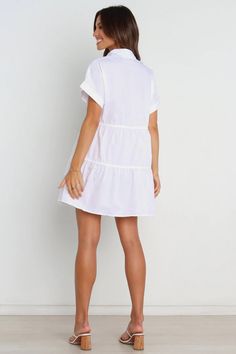 Details: Solid Basic collar Short sleeves Withdraw waist Mini dress Size and Fit: Size Length Bust S 72cm/28.3'' 83cm/32'' M 73cm/28.7'' 87cm/34.2'' L 74cm/29.1'' 93cm/36.6'' XL 79cm/29.5'' 97cm/38.2'' White Cotton Mini Hem Dress, Shift A-line Mini Dress For Daywear, White V-neck Shirt Dress With Relaxed Fit, Casual V-neck Smocked Mini Dress, Summer White Collared Dress, Collared Shift Dresses For Day Out, Cotton Mini Shirt Dress With Ruffles, Casual Short Sleeve Dresses For Daywear, Casual Summer Mini Dress With Short Sleeves