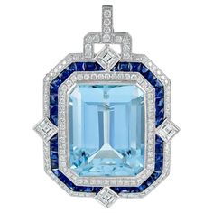 This pendant set in platinum is designed with precious aquamarine stone in the center with the total carat weight of 24.38 surrounded with stunning sapphire stone with the carat weight of 3.77, together with beautiful brilliant diamonds with the total carat weight of 3.68. Sophia D by Joseph Dardashti LTD has been known worldwide for 35 years and are inspired by classic Art Deco design that merges with modern manufacturing techniques. Chinese Pendant, Platinum Pendant, Drop Necklaces, Expensive Jewelry Luxury, Gemstone Art, Aquamarine Pendant, Art Deco Pendant, Art Deco Necklace, Expensive Jewelry