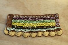 Colorful Beaded Crochet Cuff Crochet Bracelet Beaded Crochet Handmade Multicolor Earthy Beaded Bracelets, Handmade Earthy Multicolor Beaded Bracelets, Earthy Handmade Multicolor Beaded Bracelets, Earthy Handmade Festival Bracelets, Handmade Earthy Multicolor Bracelets, Handwoven Bohemian Cuff Bracelet Gift, Bohemian Handwoven Cuff Bracelet As Gift, Bohemian Handwoven Cuff Bracelet For Gift, Unique Handmade Brown Beaded Bracelets