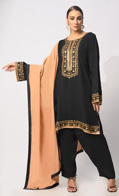 Indulge in the epitome of ethnic elegance with our exquisite 3-piece Salwar Kameez set. Intricately crafted, the Kameez boasts machine embroidery, handwork motifs, and delicate moti and CD embellishments adorning the front placket, exuding opulence and sophistication. Enhancing its allure, the Kurta features side pockets for modern convenience and intricate handwork detailing on the hem for added charm. Accompanied by a Piping matching dupatta, this ensemble effortlessly blends tradition with co Gold Salwar Kameez With Embroidered Border For Designer Wear, Traditional Salwar Kameez With Mirror Work For Eid, Traditional Shantoon Sets With Mirror Work, Elegant Kurta For Traditional Ceremonies With Embroidered Border, Gold Sharara With Embroidered Border For Eid, Embroidered Gold Palazzo Set For Eid, Eid Palazzo Set With Mirror Work In Traditional Drape, Anarkali Palazzo Set With Embroidered Border For Eid, Elegant Palazzo Set With Embroidered Border For Diwali