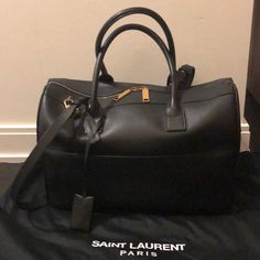 Saint Laurent Black Smooth Leather Duffle Bag. Width 15” X Height 10” X Depth 6” Saint Laurent Bags, Leather Duffle Bag, Leather Duffle, Selling On Poshmark, Saint Laurent Bag, Luxury Items, Smooth Leather, Duffle Bag, Saint Laurent