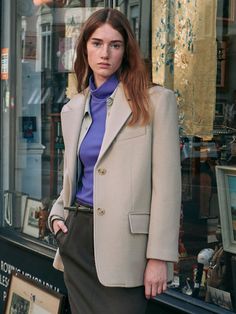 Editor's NotesThe classicjacket that made of wool fabric with warm quilting lining. Featuring thetwo-button closure at the front, flap pockets, and notched collar that givesclassic mood. The semi-oversized silhouette and the modern design make it easyto style with many winter items. - Notchedlapel collar- Two-buttonclosure- Oversizedsilhouette- Quiltedlining Measurements(in.)SIZE(55/66)-Total length: 29.13 in / 29.52 in- Shoulder: 17.32 in / 18.11 in- Chest: 42.91 in / 44.09 in- Sleeve Beige Wool Blazer With Double Button Closure, Timeless Sport Coat With Button Closure, Timeless Sport Coat With Suit Collar And Button Closure, Beige Single Breasted Wool Coat With Notch Lapel, Tailored Beige Single-breasted Wool Coat, Classic Single Button Long Wool Coat, Classic Long Wool Coat With Single Button, Timeless Blazer With Button Closure, Classic Beige Single Breasted Blazer