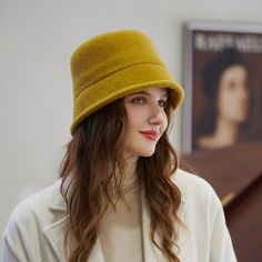 The Emes Shop hat is detailed with a sleek minimalist design. Features a solid color. wool material. and cloche hat design.MATERIAL:100% Brushed Wool BlendCIRCUMFERENCE MEASUREMENTS: 56-58cm 22-23in Casual Cloche Hat For Fall, Fitted Brimmed Winter Bucket Hat, Fitted Brimmed Bucket Hat For Winter, Classic Solid Cloche Hat For Fall, Winter Wool Cloche Felt Hat, Wool Brimmed Hats In Solid Color, Winter Wool Cloche Hat, Classic Fall Cloche Hat, Classic Solid Color Cloche Hat For Fall