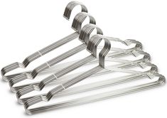 a set of six stainless steel clothes hangers on a white background with clippings