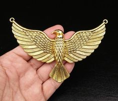 It's a very unique Vintage design Antique style Gold Eagle Pendant. Big Antique style Gold metal Eagle Pendant jewelry. Flying huge wings Eagle. Statement Pendant Necklace jewelry. High Quality Jewelry. Size: 133 mm x 90 mm. Hole: 3.5 mm. Color: Golden. Material: Zinc Alloy Metal. Quantity: 1 Piece. Flower Earrings Diy, Eagle Jewelry, Short Silver Necklace, Wings Flying, Eagle Painting, Eagle Pendant, Eagle Bird, Flying Eagle, Yoga Mala