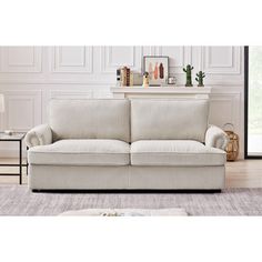 a living room scene with focus on the sofa