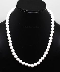 Product Details : ITEM : WHITE ONYX BEADED NECKLACEItem Code : DGC2085Gemstone Name :  WHITE ONYXChain Style : BEADEDBeads Shape : SMOOTH ROUNDBeads Size : 8mm ApproxLength : 18 INCH WITH LOBSTER CLASPWeight : 240 Cts. ApproxCustomization : **Available**Please Feel Free To Contact If You Have Any Query. Classic White Beaded Necklace, Classic White Beaded Necklaces, White Round Necklaces With Faceted Beads, White Faceted Bead Round Necklaces, White Necklaces With Round Gemstone Beads, White Gemstone Beaded Round Necklaces, White Gemstone Beads Necklaces, White Gemstone Beads Round Necklaces, White Gemstone Beads Necklace