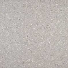 an image of a concrete surface that looks like it is made out of cement and has white speckles