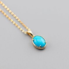 Minimal Style Turquoise Necklace Elegant Gold Turquoise Necklace With Oval Pendant, Yellow Gold Oval Turquoise Necklace Gift, Oval Turquoise Necklace In Yellow Gold As Gift, Oval Yellow Gold Turquoise Necklace As Gift, Oval Turquoise Gemstone Necklace As Gift, Oval Gemstone Turquoise Necklace Gift, Elegant Oval Turquoise Necklace As Gift, Elegant Oval Turquoise Necklace Gift, Elegant Oval Turquoise Necklace For Gift