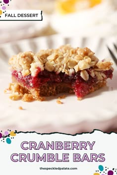 cranberry crumble bars on a white plate