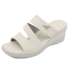 Upgrade your summer wardrobe with Siketu's Rica Cushioned Wedge Slides in Cream. These stylish and comfortable slides provide cushioned support with a trendy wedge design, making them the perfect addition to any outfit. Elevate your fashion and your comfort with these must-have slides. 2.36'' heel Slip-on PU upper Synthetic Arch support footbed™ Cushioned Insole™ Anti-skid rubber sole Platform Slip-on Slide Sandals, Casual Slip-on Wedge Sandals With Buckle, White Cushioned Wedge Slip-on Sandals, Wedge Slides, Slip-on Synthetic Wedge Sandals With Removable Insole, White Slip-on Slides With Buckle Closure, Trendy Wedges, Shoe Makeover, Arch Support