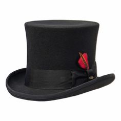 Nothing beats a top hat when it comes to magic and mystery. Our Saint Martin Magician hat casts a spell on you from the moment you try it on. Made with high-quality materials for exceptional durability, the hat looks ready to have a rabbit pulled from it at any moment. The hat features premium wool felt and a 2-inch grosgrain band with a distinctive red feather slipped into it.With sizes ranging from small to double-extra-large, this topper is sized for just about anyone. We can assist you with Formal Adjustable Top Hat With Flat Bill, High Crown Top Hat For Halloween, Adjustable Short Brim Top Hat For Costume, Magician Hat, Outback Hat, Ivy Cap, Plain Canvas, Stetson Hat, Formal Accessories