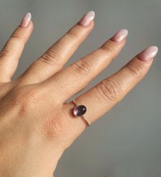 "This Oval Amethyst Gemstone Dainty Ring is a beautiful and delicate piece of jewelry that will add sparkle to any outfit. Crafted with 925 sterling silver, it features a dainty oval minimalist ring set in amethyst crystal, making it an eye-catching accessory for everyday wear or special occasions. The perfect birthstone crystal ring for yourself or as a meaningful gift for someone special. * 925 Sterling Silver ring with a Amethyst Crystal  * Delicate, dainty design perfect for everyday wear or special occasions. * Perfect gift for her - sister, mother, daughter, friend, or yourself. * Comes in an elegant jewelry box, ready for gifting. * Nickel-free and hypoallergenic. * High-quality gemstones sourced from India. * Handmade using traditional artisan techniques. * Lightweight and comforta Amethyst Oval Ring, Dainty Amethyst Stackable Rings For Promise, Stackable Amethyst Promise Ring, Dainty Amethyst Birthstone Ring, Amethyst Stackable Rings As Gift, Minimalist Amethyst Jewelry For Promise Ring, Dainty Amethyst Ring Jewelry, Delicate Amethyst Ring As Gift, Everyday Oval Crystal Ring With Gemstone