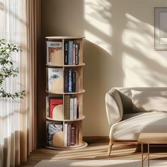 a living room with a couch and bookshelf next to a window in the corner