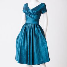 Nwt Pinup Couture Ava Blue Teal Satin Swing Dress It's Like A Teal Blue Turquoise, Really Pretty Satin Look, Stretchy Material: 60% Polyester 35% Nylon 5% Spandex Flat Lay Measurements: Waist: 11" Armpit To Armpit: 14" Total Length: 43" Fitted Dress With Pleated Bodice And Full Skirt, Fitted Tea Length Dress With Pleated Bodice For Cocktail, Fitted Pleated Bodice Tea Length Dress For Party, Party Tea Length Dress With Pleated Bodice, Fitted Full Skirt Dress With Ruched Details, Fitted Short Sleeve Pleated Dresses, Fitted Pre-draped Knee-length Dress, Fitted Ruched Dress With Full Skirt, Fitted Tea Length Dress With Full Skirt For Evening