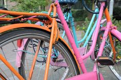 several bicycles are parked next to each other