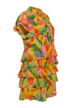 Soak up the sun in Farm's whimsical "Beaks & Bananas" mini dress! This bold and bright yellow number features a playful tropical design, flirty flutter sleeves, and romantic ruffles. Perfect for a vibrant vacation or brunch look, style this pretty pleated dress with hot pink strappy sandals and a white raffia bag. Size S 100% Viscose Lined Partial front button Pleated Flutter sleeves Ruffled tiered skirt Mini length Bust 38" Waist 33.5" Shoulder to hem 34" Spring Fun Mini Dress, Mini Tropical Print Dress, Vibrant Printed Summer Mini Dress, Vibrant Printed Mini Dress For Summer, Flirty Summer Holiday Dresses, Summer Tiered Dress With Tropical Print, Tropical Ruffle Dress For Garden Party, Summer Tropical Tiered Dresses, Tropical Sleeveless Dress With Ruffles