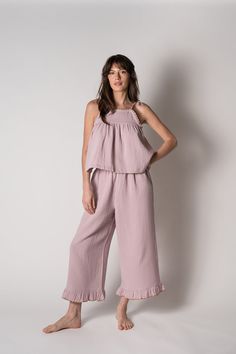 Not just for sleeping, this 100% organic gauze cotton lounge set is soft, lightweight and breathable. Perfect to wear on a summer day or evening! Wear to the beach or just relaxing at home. Made with adjustable shoulder ties and a drawstring waist for added comfort. Finished with contrast scalloped edges and a  yoke se Casual Cotton Sleepwear With Ruffles, Feminine Summer Lounging Sleepwear, Summer Cotton Sleepwear For Relaxation, Feminine Summer Sleepwear For Relaxation, Chic Summer Cotton Sleepwear, Summer Sleepwear With Elastic Waistband For Relaxation, Chic Cotton Sleepwear For Loungewear, Summer Vacation Sleepwear With Ruffles, Chic Summer Sleepwear For Loungewear