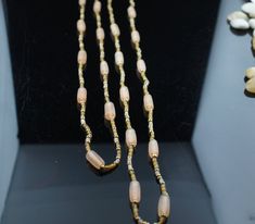 This is the perfect option for those who like cool, unique jewelry and the luxury, shine of beige, gold tone. This set is well made, cute and/or elegant in design, and very desirable. The set has 2 necklaces . The set is decorated with beige, gold tone beads. The beads have different shapes. The necklaces are identical. They have different lengths. The clasp is good condition. ♥ Age/era: Circa 1970s - 1980s. ❤️ The necklaces are about 31'', 37'' long. ❤️ The necklaces are no signed. Every one in Elegant Beige Beaded Necklaces With Large Beads, Elegant Beige Beaded Necklace With Large Beads, Elegant Cream Beads For Gifts, Beige Beaded Chain Jewelry Gift, Beige Beaded Necklace With Gold Round Beads, Gold Necklaces With Oval Beads For Party, Beige Beaded Chain Jewelry As Gift, Beige Beaded Chain Jewelry For Gifts, Beige Large Beads Jewelry Gift