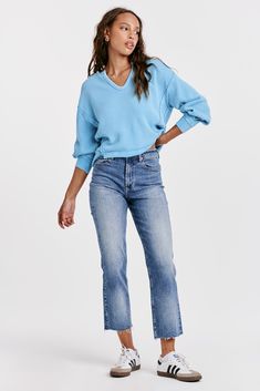 The 90s Jean in Mozzie presents a timeless style with a modern twist. Crafted from stretch denim with a high rise fit that sits slightly lower on the waist and fitted in the hips, these ankle skinnies promise a chic, sleek fit. 9 1/2" Front Rise (include waistband), 10" Leg Opening, 28" inseam (Size 27) 90% COTTON 8% POLYESTER 2% SPANDEX Machine wash cold, Tumble dry low Imported Zip fly and button closure Five-pocket style