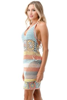 Final Sale - Get it before it's gone! You'll be ready for the beach in the Mindy Pink and Blue Sheer Crochet Swim Cover-Up! Alternate rainbow crochet knit (with stripes and grandma crochet squares) shapes this cute swim cover-up (in hues of pink, blue, ivory, and yellow) with a halter neckline, sleeveless bodice, and mini skirt with scalloped hem. Layer over your favorite bikini for a cute beachy look! DETAILS & FIT Bodycon Fit. Cotton. Hand wash cold. Imported. Multicolor Crochet Swimwear For Summer, Fitted Multicolor Crochet Swimwear, Multicolor Crochet Top For Spring Beach Cover-up, Bohemian Multicolor Crochet Swimwear, Spring Poolside Crochet Top, Multicolor Beachy Crochet Dress For The Beach, Crochet Dress For Beach Vacation, Beach Season Crochet Dress For Vacation, Multicolor Crochet Beachwear Dress