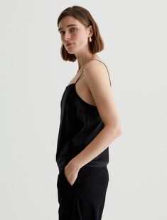 The Yenna classic-fit cami exudes elegance, bringing an effortless allure to any outfit. Crafted from stretch-blend Luxe Silk in black, this bias-cut camisole has a straight neckline and slim, adjustable straps that let you personalize the fit.Luxe Silk, 92% Silk, 8% Elastane Fitted Camisole With Adjustable Straps And Straight Neckline, Sleek Fitted Camisole With Spaghetti Straps, Sleek Fitted Camisole, Sleek Cami Tank Top For Evening, Evening Tank Top With Spaghetti Straps, Sleek Cami Top For Evening, Sleek Fitted Tank Camisole, Sleek Sleeveless Camisole With Adjustable Straps, Sleek Camisole Tank Top For Night Out