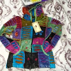 India Boutique Zip Up Hoodie Juniors Size Large Multicolored 2 Pockets Nwt Multicolor Cotton Hoodie For Winter, Blue Cotton Hooded Sweater, Blue Patchwork Hoodie Sweatshirt, Casual Multicolor Hooded Sweater, Multicolor Casual Winter Hooded Jacket, Casual Multicolor Hooded Winter Jacket, Casual Multicolor Winter Hooded Jacket, Blue Patchwork Hooded Sweatshirt, Multicolor Patchwork Top For Winter