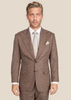 Be the best dressed at your next event with the Tawny Brown Hopsack Suit. This cool and stylish suit exudes elegance and luxury. Custom made from a luxurious bamboo/wool/linen/silk blend from Cavani, you're guaranteed to look as good as you feel. Dress to impress with this must-have suit. Elegant Single Button Linen Sport Coat, Elegant Brown Three-piece Suit With Single Button, Luxury Linen Tweed Jacket With Notch Lapel, Luxury Linen Tweed Jacket For Business, Tailored Luxury Linen Blazer, Luxury Tailored Linen Blazer, Luxury Single-button Sets With Notch Lapel, Luxury Linen Business Tweed Jacket, Elegant Linen Blazer With Concealed Placket