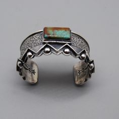 "Handcrafted this Number Eight turquoise sterling silver \" Maze of Life \" cuff bracelet.  It weighs 106.3 gr, and the cuff is 6\" inside plus a 1.5\" gap, which will fit up to an 8 1/2\" wrist. I Would love to see it go to a good home." Turquoise Sterling Silver Cuff Bracelet With Polished Finish, Artisan Turquoise Cuff Bracelet In Sterling Silver, Unique Sterling Silver Cuff Jewelry, Adjustable Stamped Turquoise Ring In Sterling Silver, Adjustable Stamped Sterling Silver Turquoise Ring, Turquoise Stamped Sterling Silver Cuff Bracelet, Turquoise Patina Sterling Silver Cuff Bracelet, Engraved Sterling Silver Cuff Jewelry, Stamped Sterling Silver Cuff Bracelet