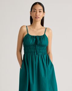 Discover the effortless charm of our 100% Organic Cotton Keyhole Midi Dress. Crafted with care from premium organic cotton poplin, this must-have dress has a cool, crisp look and a lightweight feel. The smocked bodice hugs your ribs in a flattering yet comfortable way, while the front tie and adjustable straps allow you to customize the fit. Best part: it has pockets! Easy to dress up or down, this chic silhouette works for a range of occasions.  | Quince | Women's Keyhole Midi Dress in Garden G Relaxed Cotton Dress For Garden Party, Relaxed Fit Cotton Dress For Garden Party, Cotton Ruched Midi Dress For Brunch, Cotton Midi Dress With Smocked Back For Brunch, Cotton Sundress With Smocked Back For Brunch, Green Cotton Mini Dress For Brunch, Cotton Midi Sundress For Brunch, Spring Cotton Sundress For Daywear, Cotton Ruched Mini Sundress