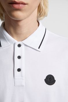 Designed for modern men who place equal value on function and aesthetics, this polo shirt goes from workday to weekend. The classic polo is crafted from cotton piquet. Luxury Polo Shirt With Collared Neckline For Work, Luxury Collared Polo Shirt For Workwear, Designer Cotton Polo Shirt, Designer Collared Cotton Polo Shirt, Luxury White Polo Shirt With Ribbed Collar, Luxury Cotton Polo Shirt, Luxury Cotton Polo Shirt For Workwear, Luxury Cotton Polo Collar Top, Luxury Cotton Top With Polo Collar