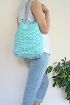 Hand crochet bag which you can easly convert to a backpack! #bucketbag #crochettotebag #bucketbackpack #rucksack Casual Everyday Bucket Bag With Leather Handles, Trendy Summer Shoulder Bag Backpack, Trendy Summer Backpack For Daily Use, Handmade Cotton Hobo Bag For Everyday Use, Handmade Cotton Hobo Bag For Travel, Casual Crochet Backpack Bag For Daily Use, Large Capacity Summer Backpack Shoulder Bag, Bohemian Bucket Bag With Adjustable Strap For Everyday, Casual Crochet Backpack For Daily Use