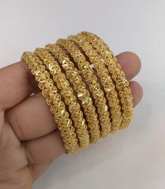 24ct Gold plated high quality bangles looks like real gold. Excellent quality bangles.  Set of 6 bangles.  www.tulipjewelsnbeauty.com Check my shop policy before making any purchase. Pakistani Gold Jewelry, Simple Gold Bangle, Wedding Jewelry Gold, Gold Bracelet Wedding, Gold Bangles Indian, Gold Bangles For Women, Gold Bangle Set, Gold Wedding Jewelry, Gold Aesthetic