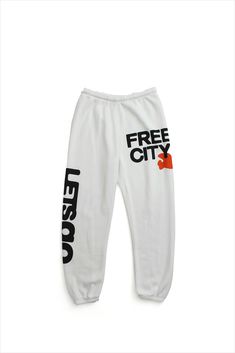 Unisex sweatpant with classic "Free City" print in black and yellow. A supersoft essential sweatpant with a covered elastic waist and a pull drawstring. WHY WE LOVE IT FREECITY, born in 2001, uses local factories with custom developed materials, fabrications, washes and dyes. Prints are hand-thrown, using hand-mixed paint with on-screen mixed gradients - made one by one, in small batches. DETAILS Medium weight polyblend: 50% rayon, 25% polyester, 25% cotton. Hand-sewn, washed, and hand-screen pr Free City Sweats, Sporty Logo Print Bottoms For Loungewear, Athleisure Cotton Bottoms With Logo Print, Athleisure Bottoms With Logo Print, Athleisure Bottoms With Logo Print For Loungewear, Cotton Athleisure Bottoms With Logo Print, Sporty Loungewear Bottoms With Logo Print, Athleisure Bottoms For Loungewear With Logo Print, Sporty Cotton Sweatpants For Streetwear