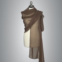 A very elegant and luxury shawl for your wedding dress made of the finest crepe chiffon Color: brown taupe Size : 200 x 50 cm ( approx) You can wear it on your shoulders or you can use any brosche to close it. More colors available, please ask. Luxury Shawl, Wrap Shrug, Evening Dress Wedding, Brown Shawl, Pink Shawl, Taupe Dress, Dress Bridesmaids, Chiffon Shawl, Dress With Shawl